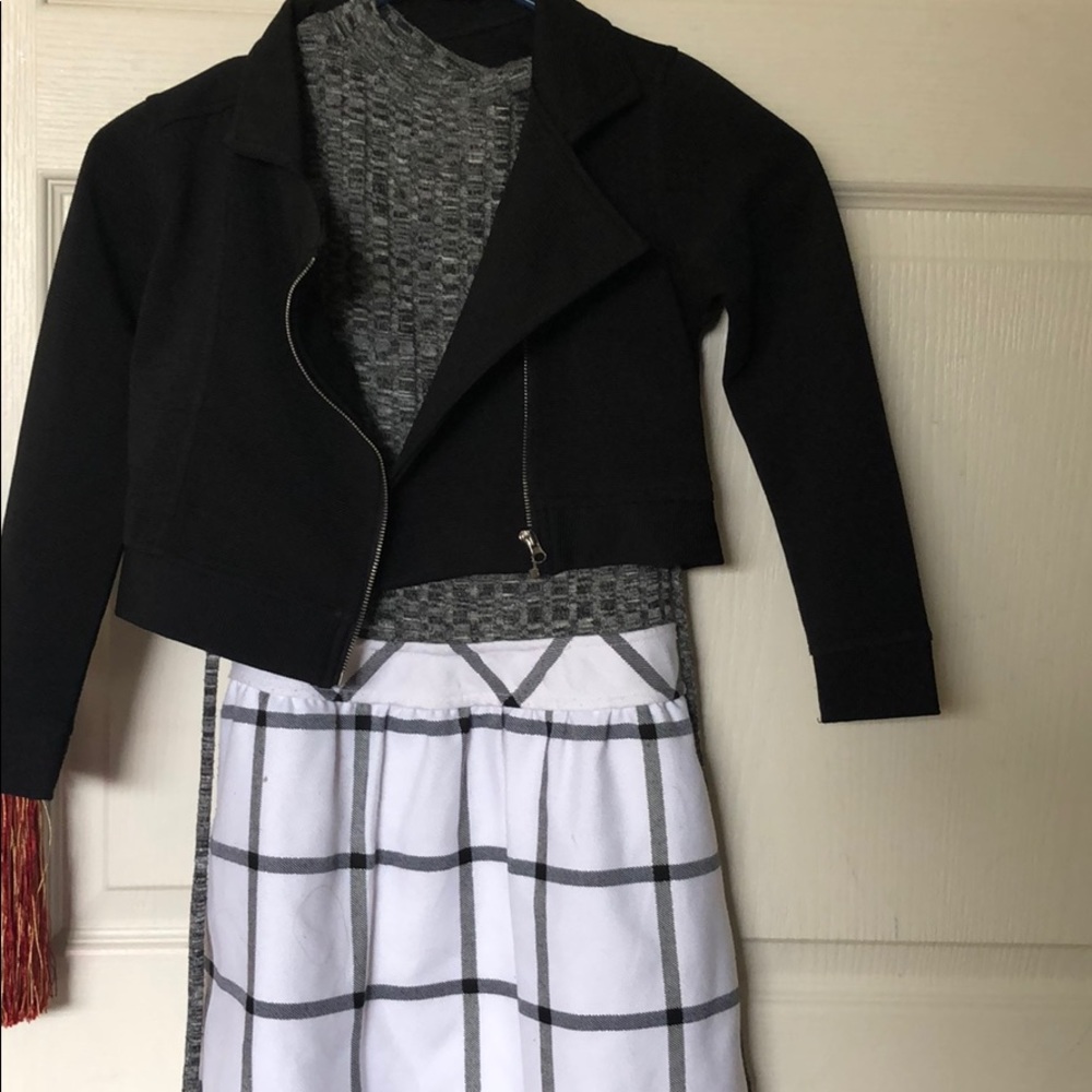 Adorable dress with matching crop jacket.
